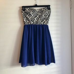 Short strapless dress.